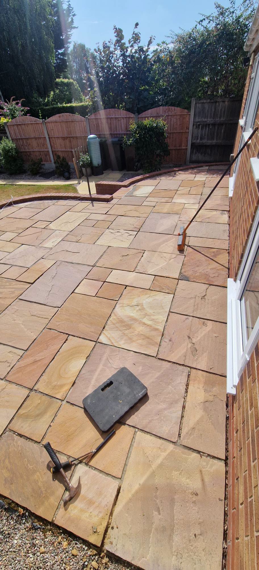 Large sandstone patio after professional patio restoration in Worcester