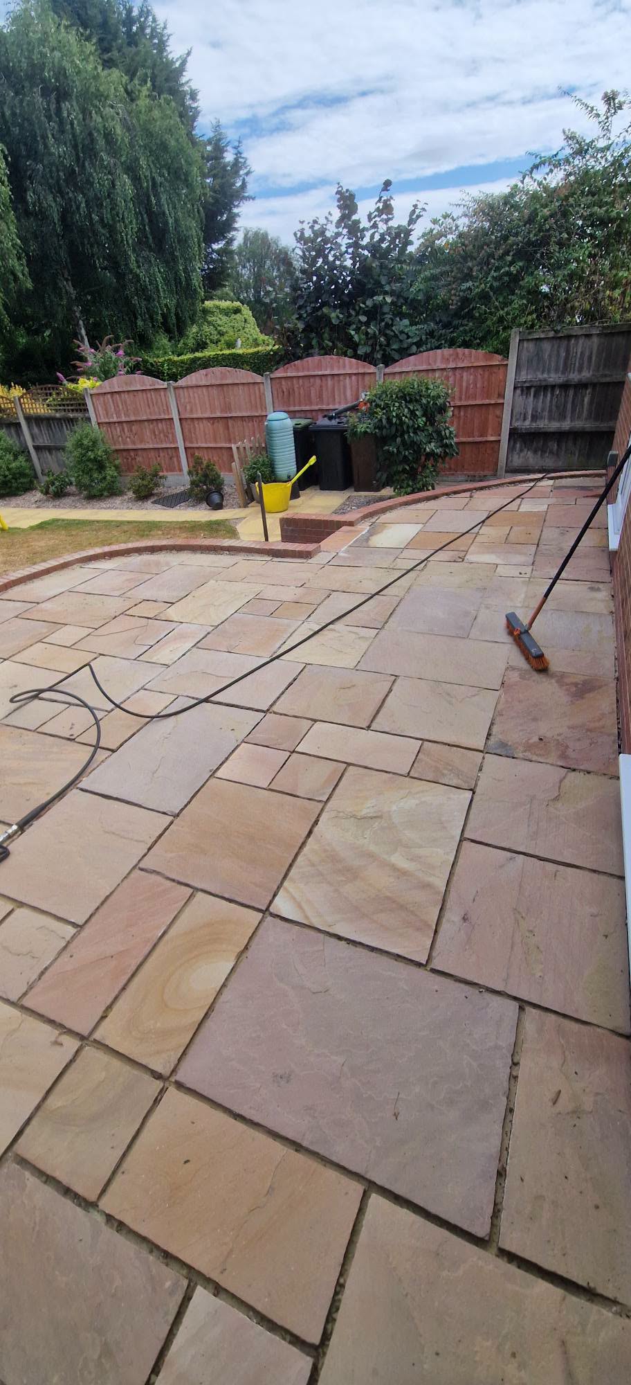 Restored sandstone patio after professional patio cleaning and rejointing in Redditch, Worcestershire