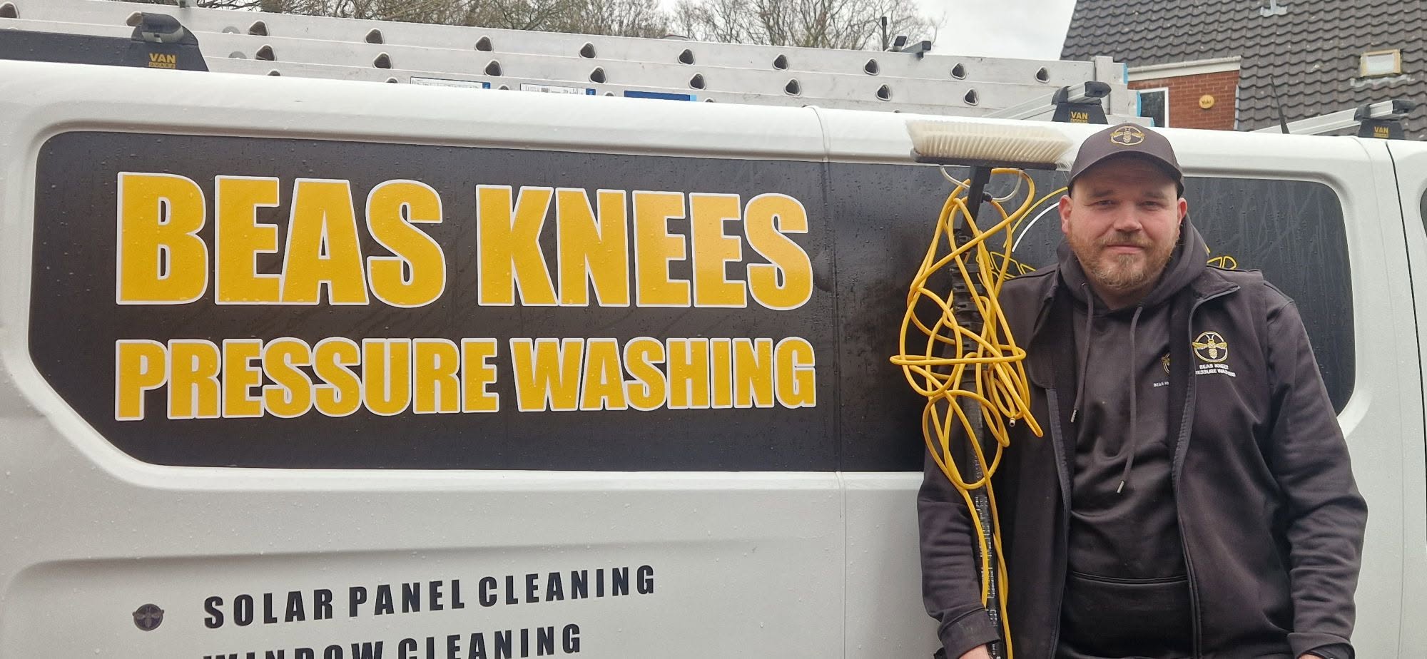 James, owner of Beas Knees Pressure Washing, beside the sign-written van with his water-fed pole in Redditch