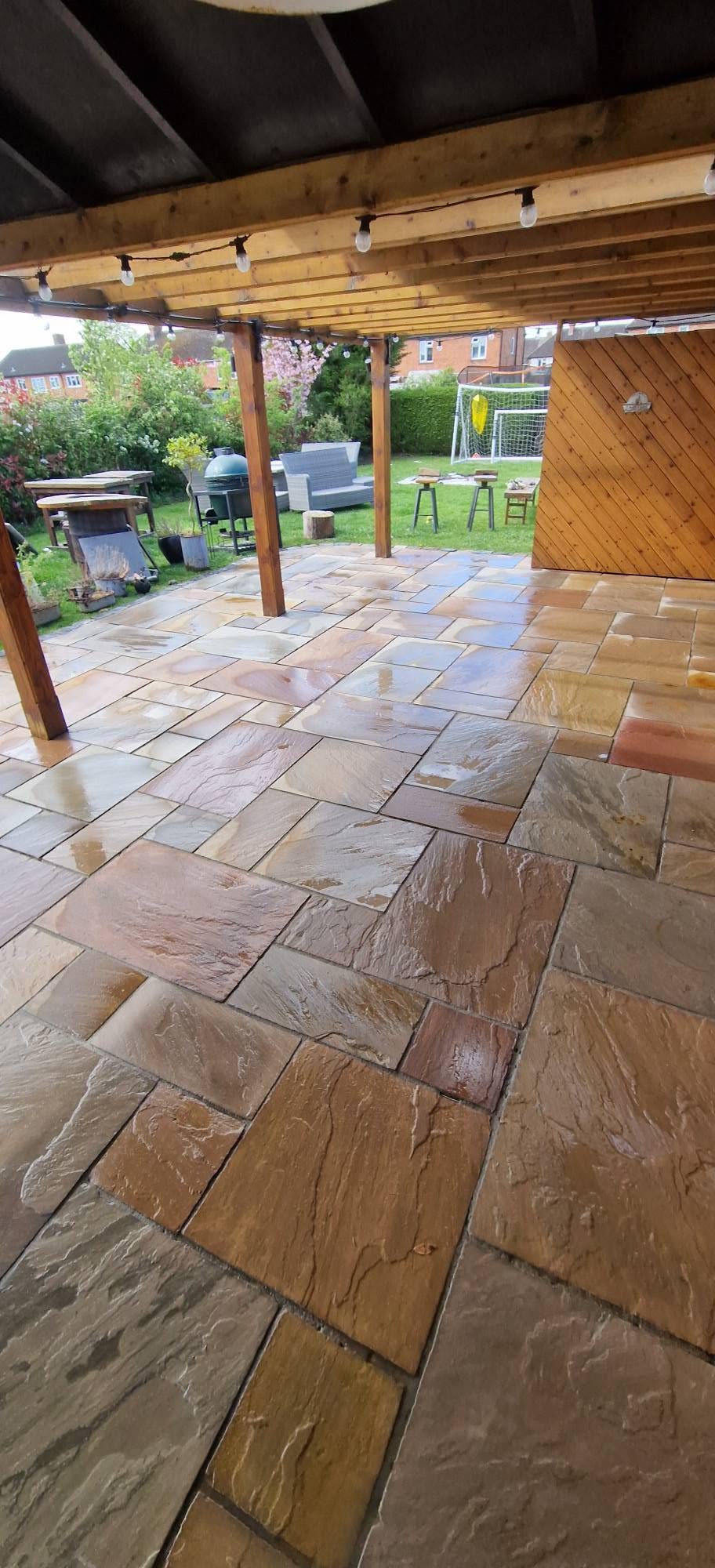 Restored sandstone patio after professional patio cleaning and rejointing in Redditch, Worcestershire