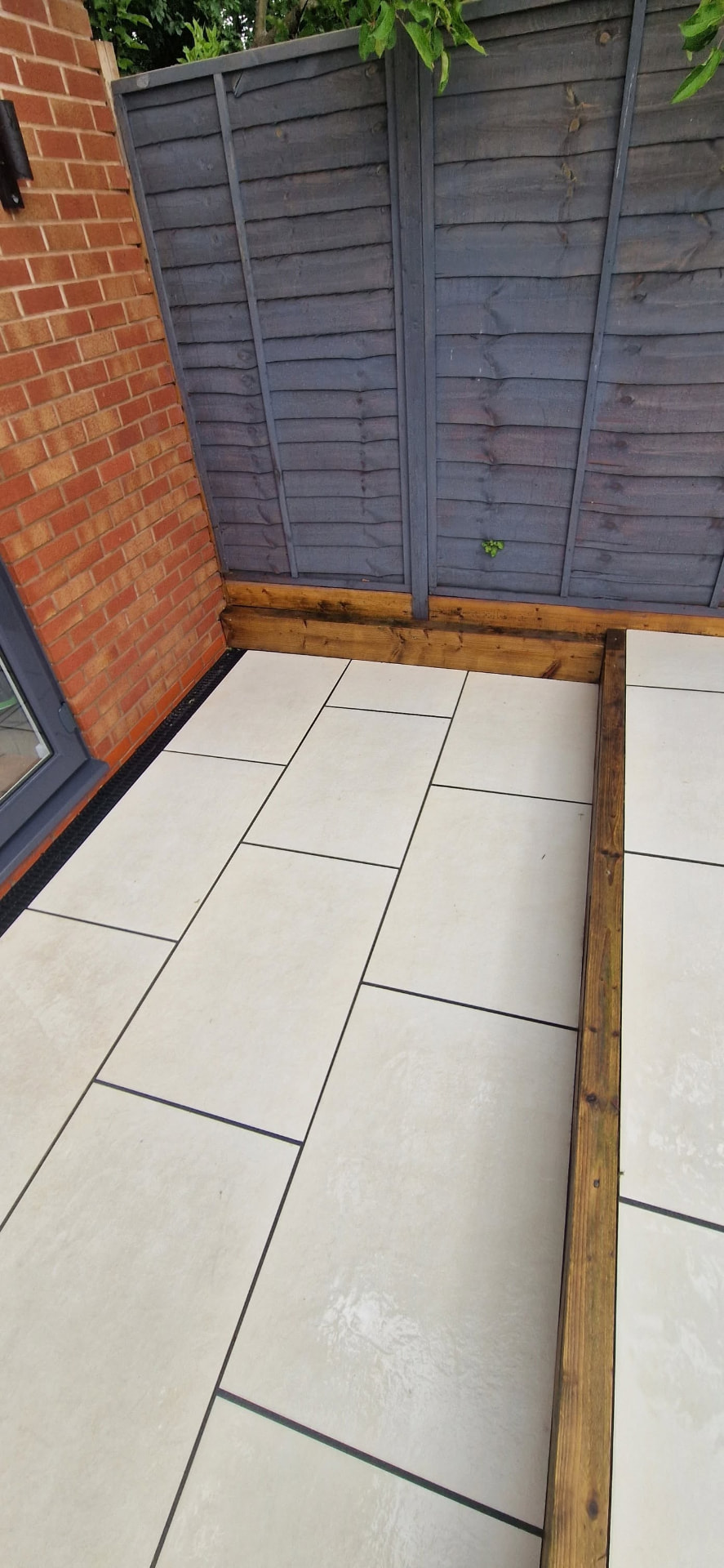 Restored sandstone patio after professional patio cleaning and rejointing in Redditch, Worcestershire
