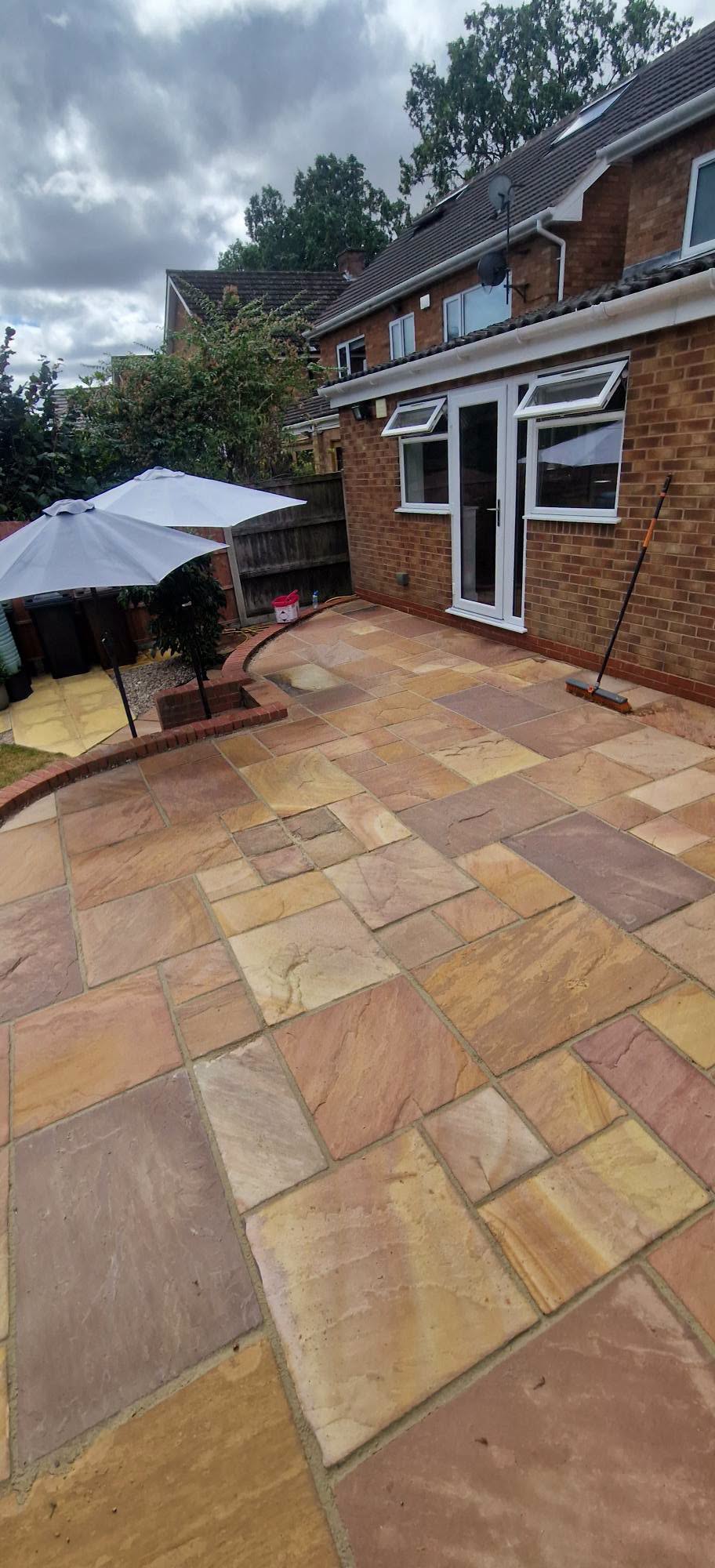 Restored sandstone patio after professional patio cleaning and rejointing in Redditch, Worcestershire