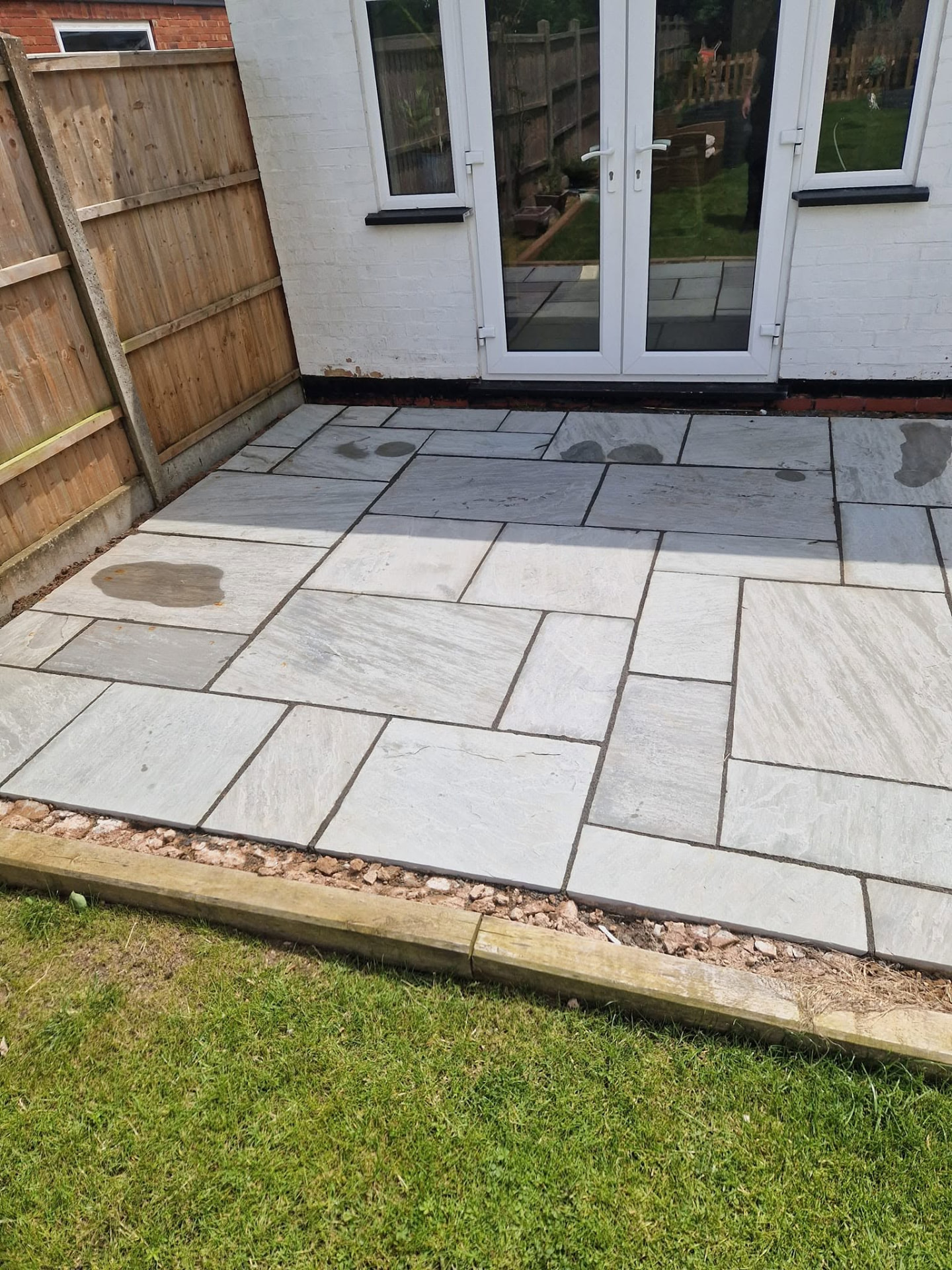 Restored sandstone patio after professional patio cleaning and rejointing in Redditch, Worcestershire
