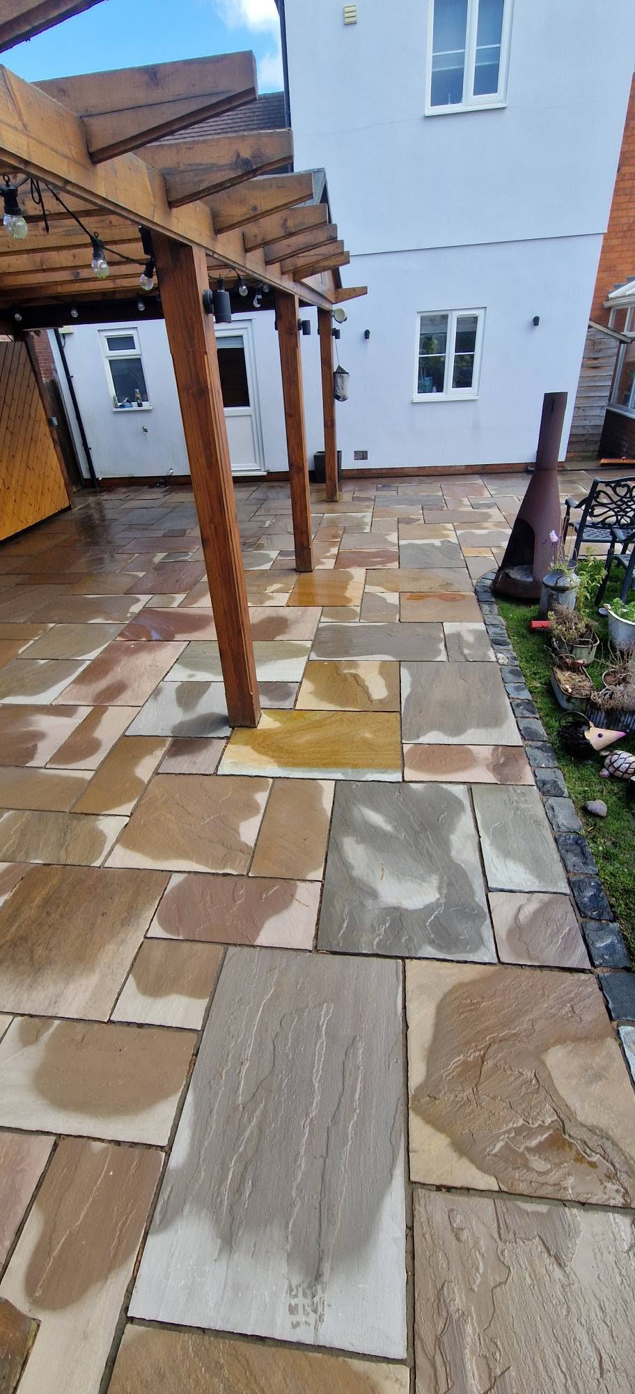Restored sandstone patio after professional patio cleaning and rejointing in Redditch, Worcestershire