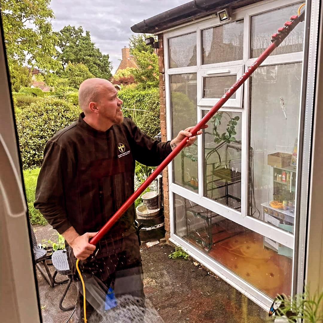 Pure water reach pole window cleaning on a conservatory window in Redditch, Worcestershire