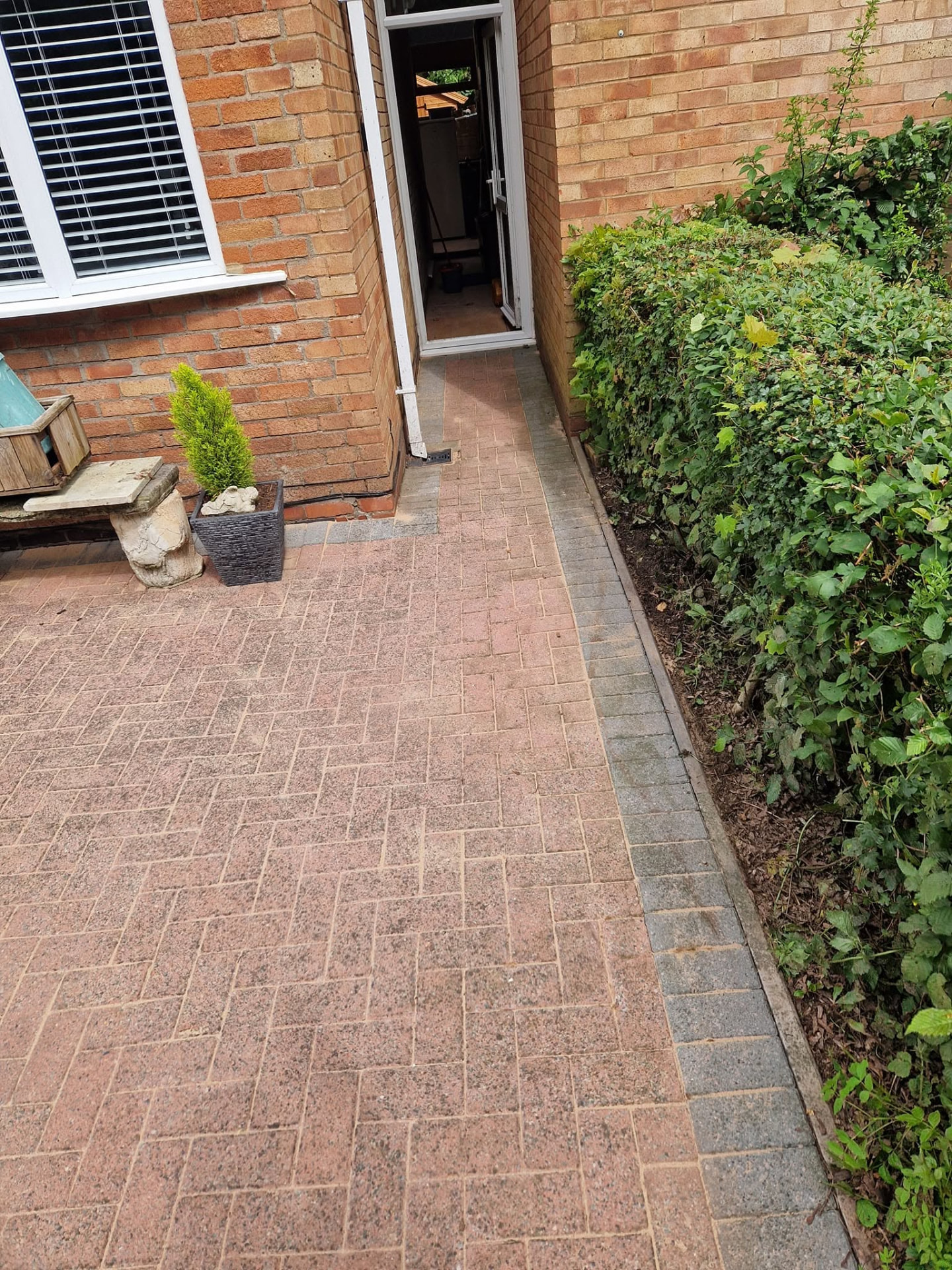 Restored sandstone patio after professional patio cleaning and rejointing in Redditch, Worcestershire