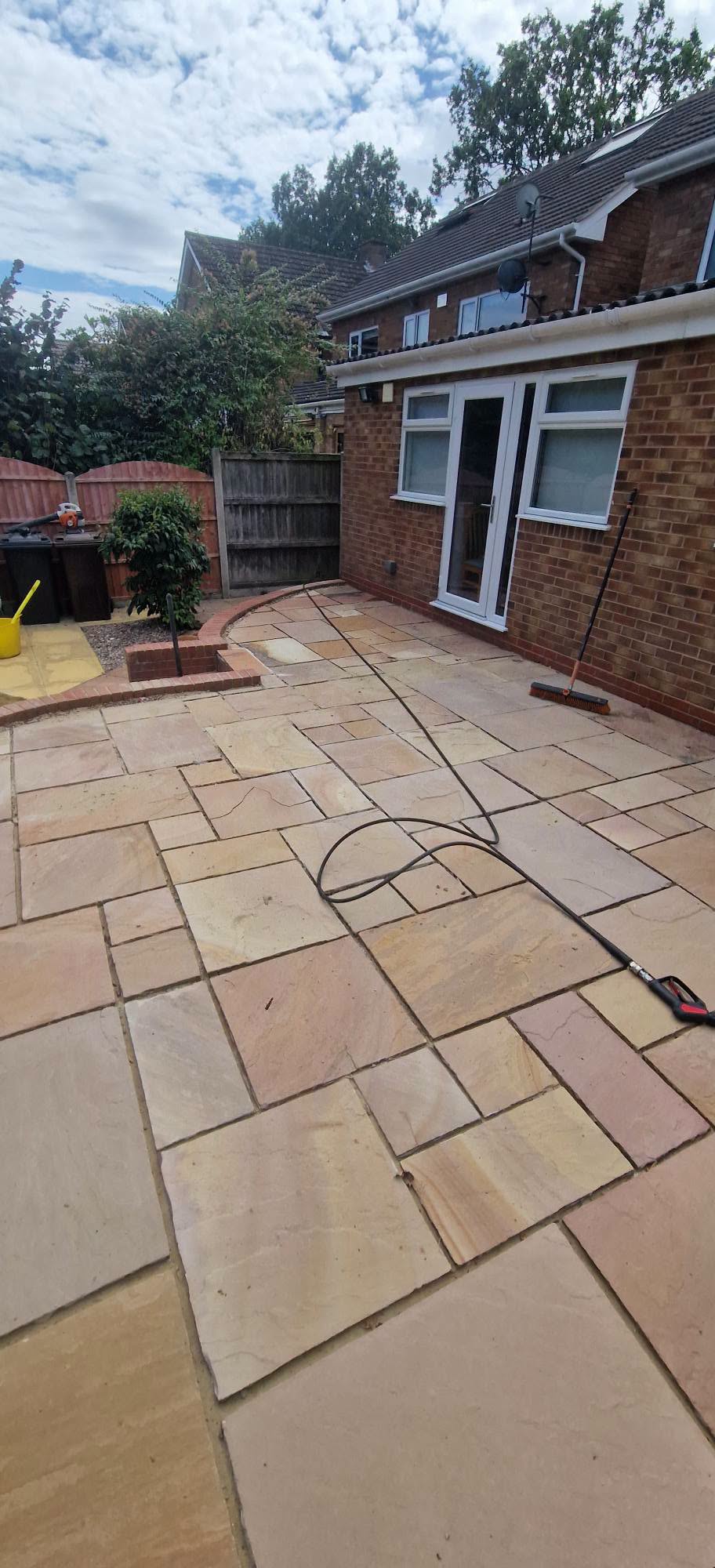 Restored sandstone patio after professional patio cleaning and rejointing in Redditch, Worcestershire