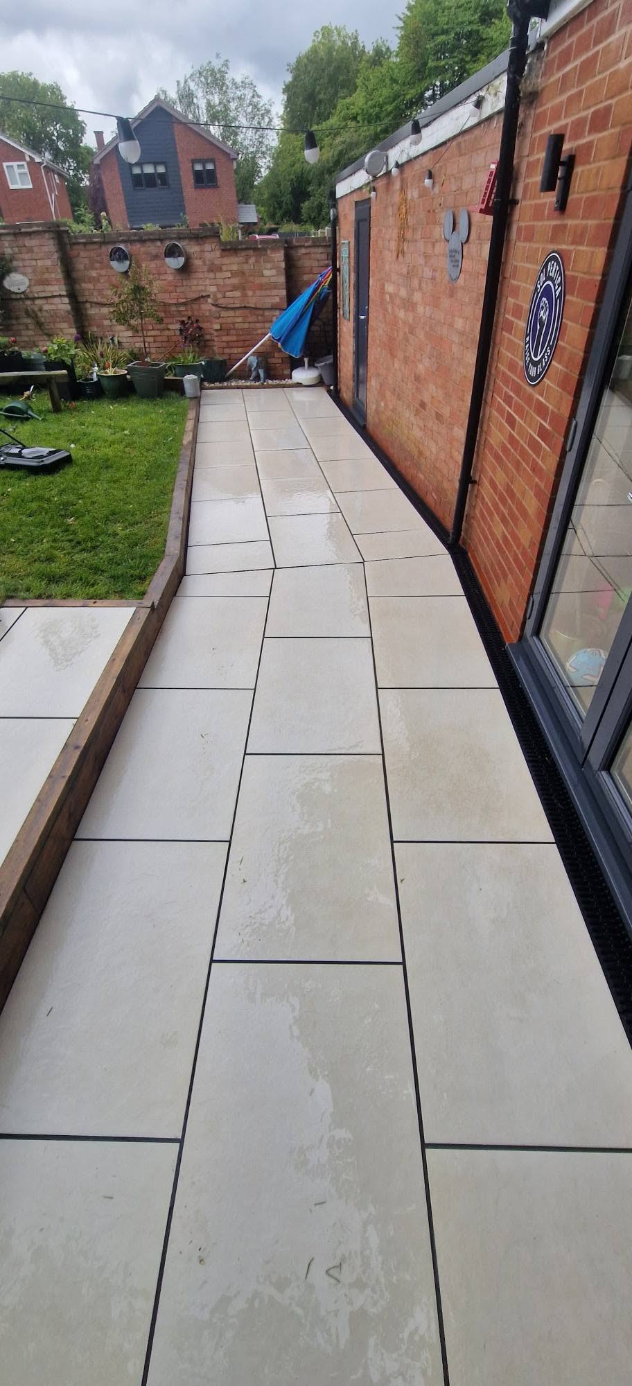 Restored sandstone patio after professional patio cleaning and rejointing in Redditch, Worcestershire